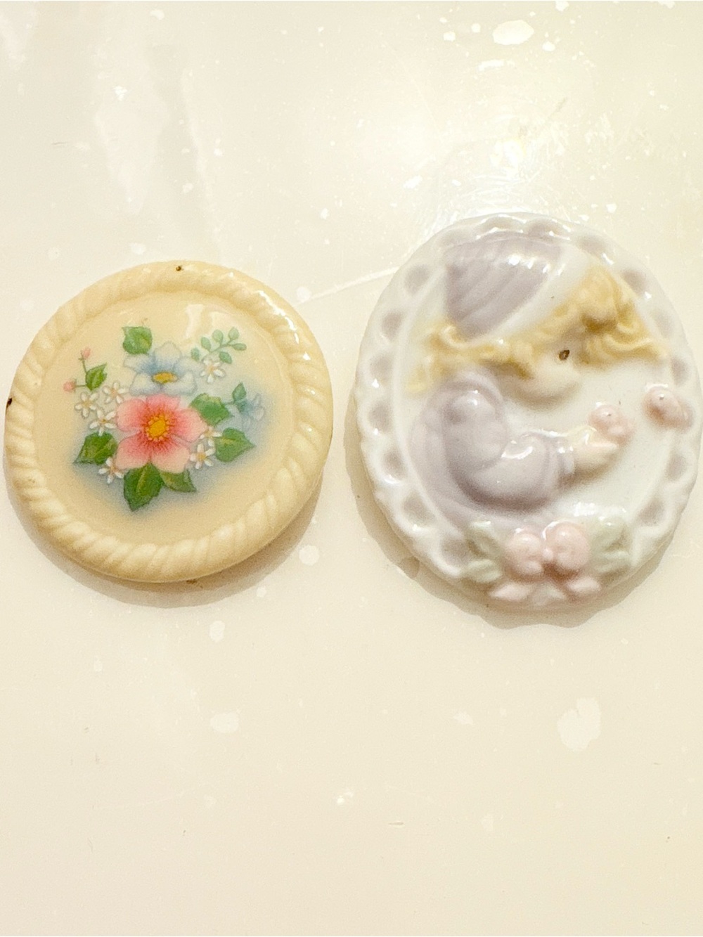 Avon Floral and Angel Cameo Brooches in Cream, Pink, Green